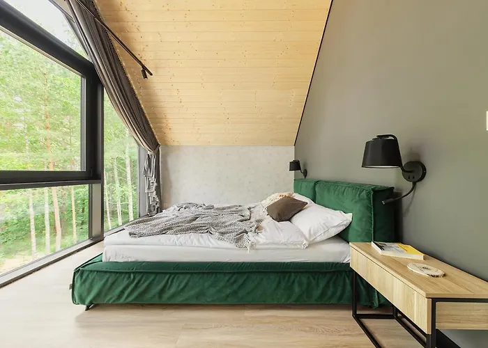 Miedzy Drzewami Ferienhaus *