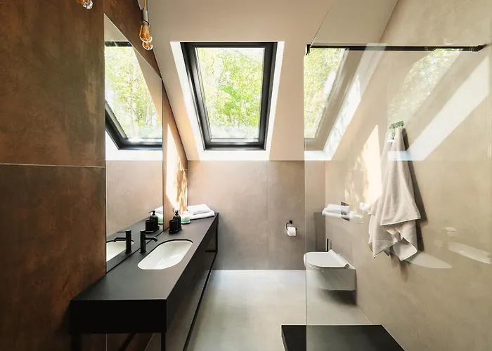 Miedzy Drzewami Ferienhaus *